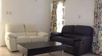 Garden Condos El Batey فندق
